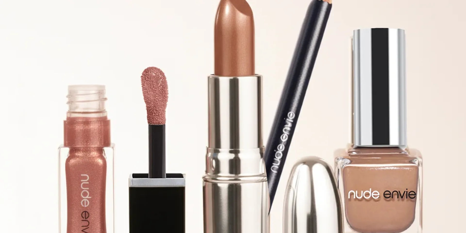 Nude Envie nail lacquer arranged for a soft, polished manicure
