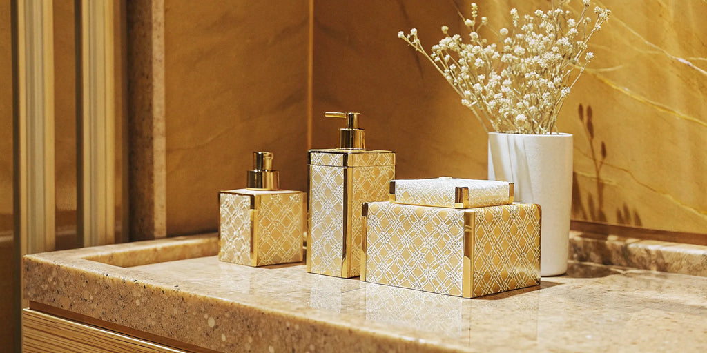 A luxury beauty gift set with elegant gold and white packaging.